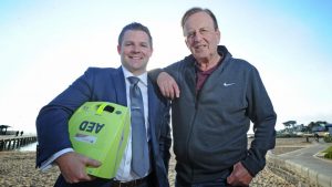 Tom Friedman (right) with Dane Costello — the Brighton-based real estate agent who gave him CPR after the 65-year-old had a sudden heart attack at an auction. Picture: Andrew Henshaw